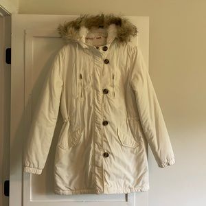 White winter coat with fur trimmed hood